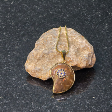 Ammonite Fossil and Evil Eye Pendant