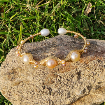 Bangle with different sizes of freshwater pearls