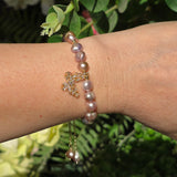 Adjustable Pearl bracelet with a butterfly charm