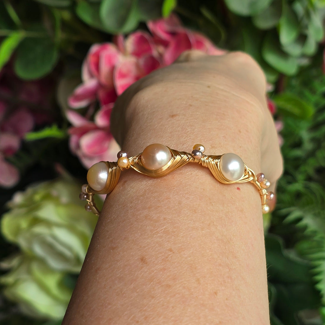 Bangle with different sizes of freshwater pearls