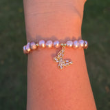 Adjustable Pearl bracelet with a butterfly charm