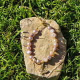 Adjustable Pearl bracelet with a butterfly charm